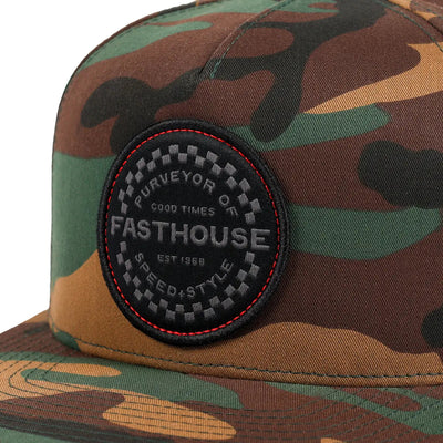 Close-up of Anchor Hat Camo Hat showing Embroidered circular patch with red stitching border and speedway-pattern trim, gray