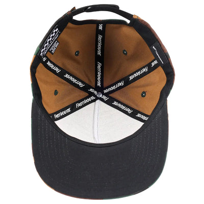 Close-up of Anchor Hat Camo Hat showing Black structured cap with tan and brown suede paneling, black text tape across