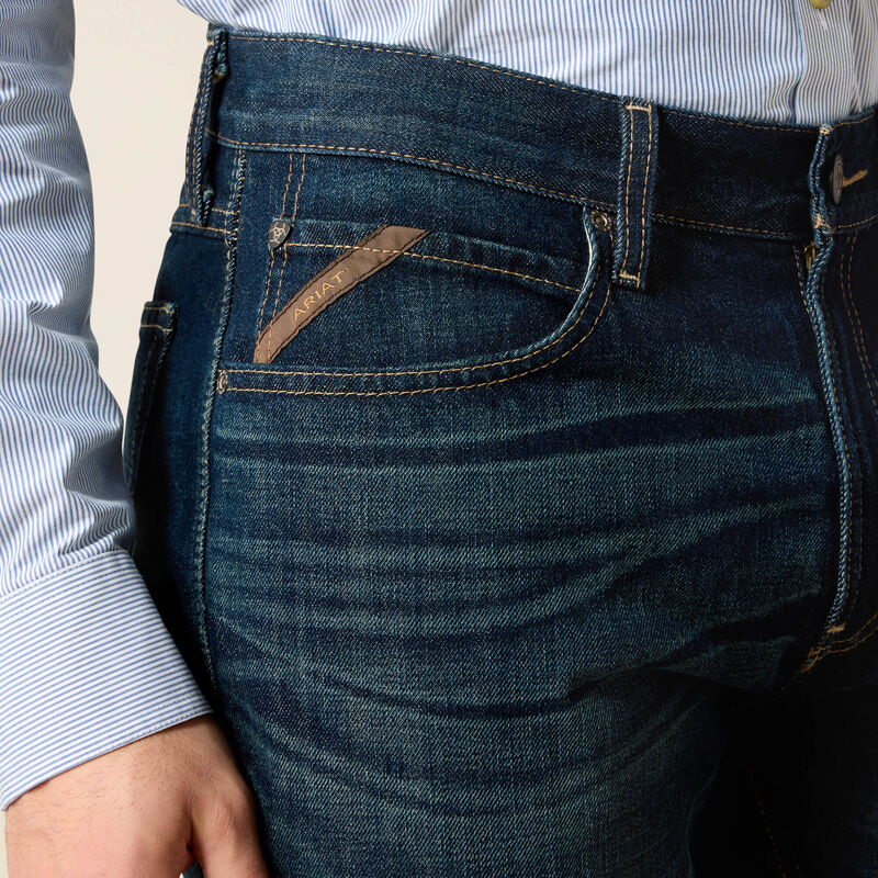 Back of M4 Legacy Bootcut Pants Freeman Pants, Dark indigo denim with tan leather back-pocket patch detail - Slowride Supply
