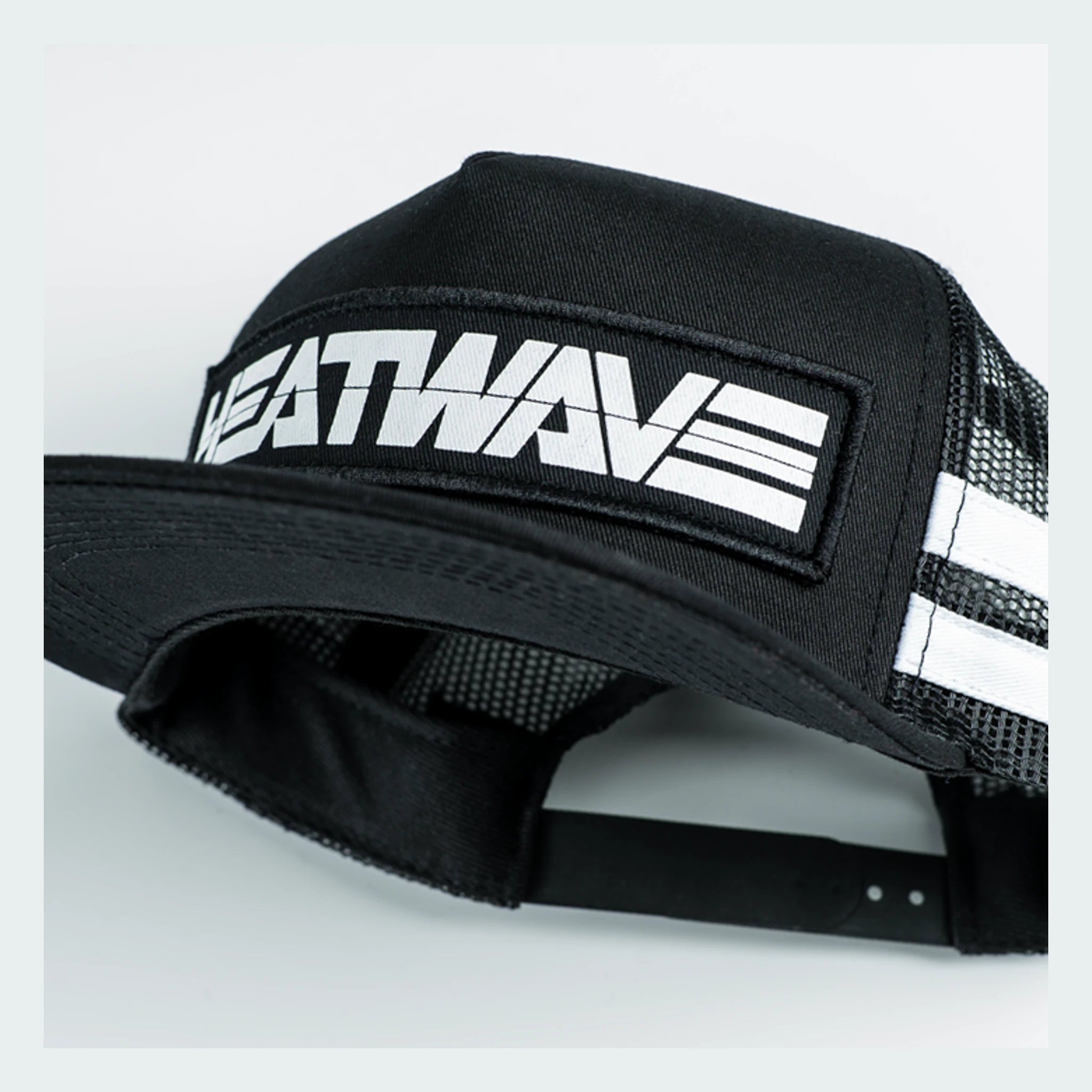 Back of Billboard Trucker Black Hat, Black mesh back with white striped panels and snap closure - Slowride Supply