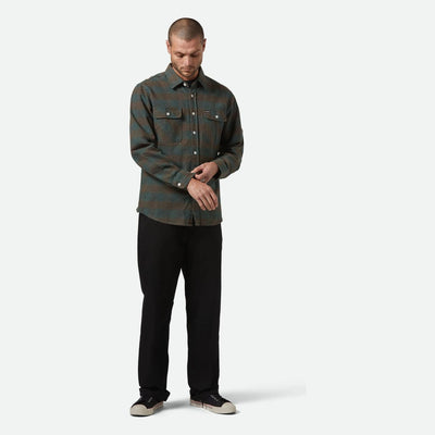 Person wearing Bowery Flannel Ocean L/S Woven L/S Woven, Neutral studio setting with plain white background - Slowride Supply