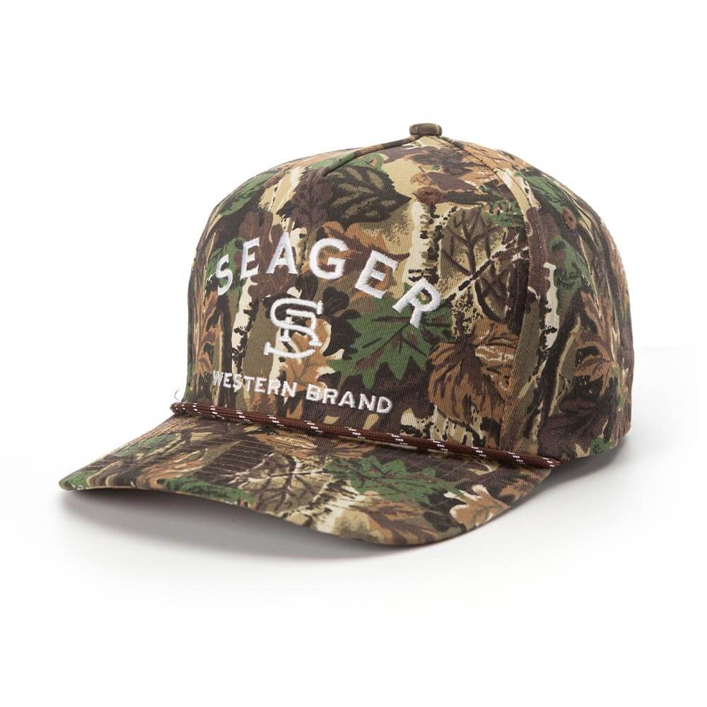 Close-up of Branded Snapback Cream/brown Hat showing Camouflage fabric in cream, brown, and green with white embroidered