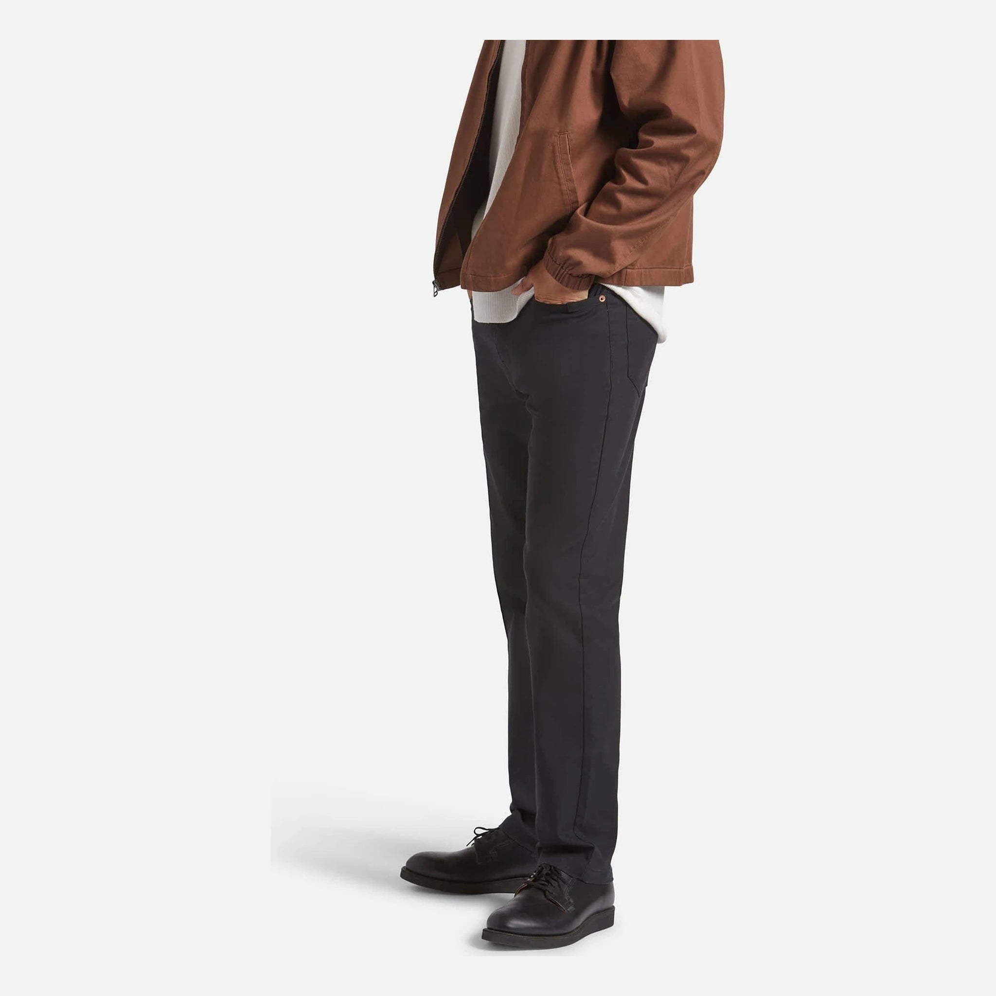 Person wearing Builders 5 Pocket Pant Pants Black Pants, Neutral studio setting with white background - Slowride Supply