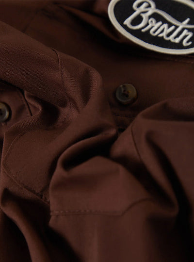 Close-up of Builders Olson S/s Woven Apparel Chocolate Apparel showing Chocolate woven fabric with dark horn buttons and