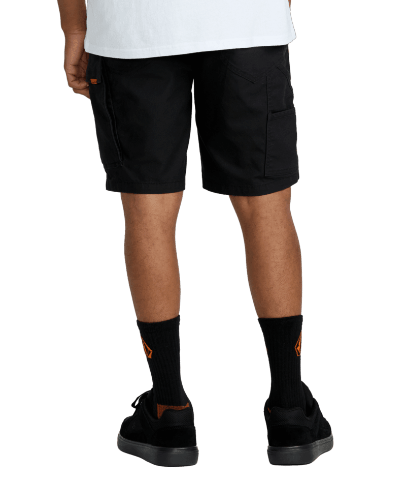 Person wearing Caliper II Relaxed Work Short Shorts Black Shorts, Wearer standing against neutral white background, black