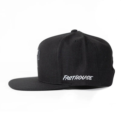 Close-up of Capital Hat Apparel Black Apparel showing Black snapback with white italic text on front, gray patch visible on