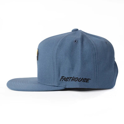 Close-up of Capital Hat Apparel Black Apparel showing Slate blue six-panel cap with black embroidered text on crown and