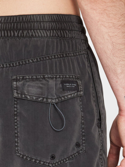 Close-up of Center Trunk 17" Boardshorts Black Boardshorts showing Back pocket with woven brand label and drawstring detail