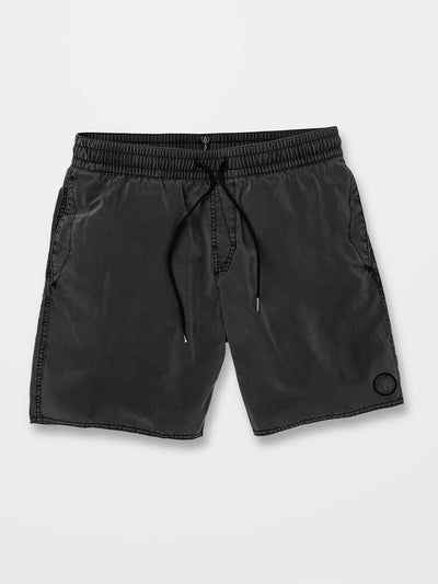 Center Trunk 17" Boardshorts front view, Black shorts with drawstring waist and small circular emblem on lower right leg,
