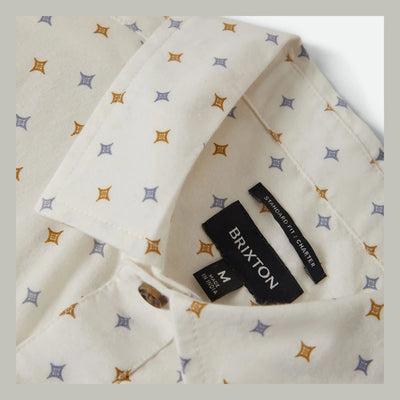 Care label on Charter Print SS Woven S/S Woven Future Grey/ Diamond Tile S/S Woven showing Black label reading "BRIXTON"