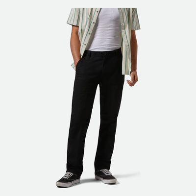 Person wearing Choice Chino Pant Pants Black Pants, Neutral studio setting with plain white background - Slowride Supply