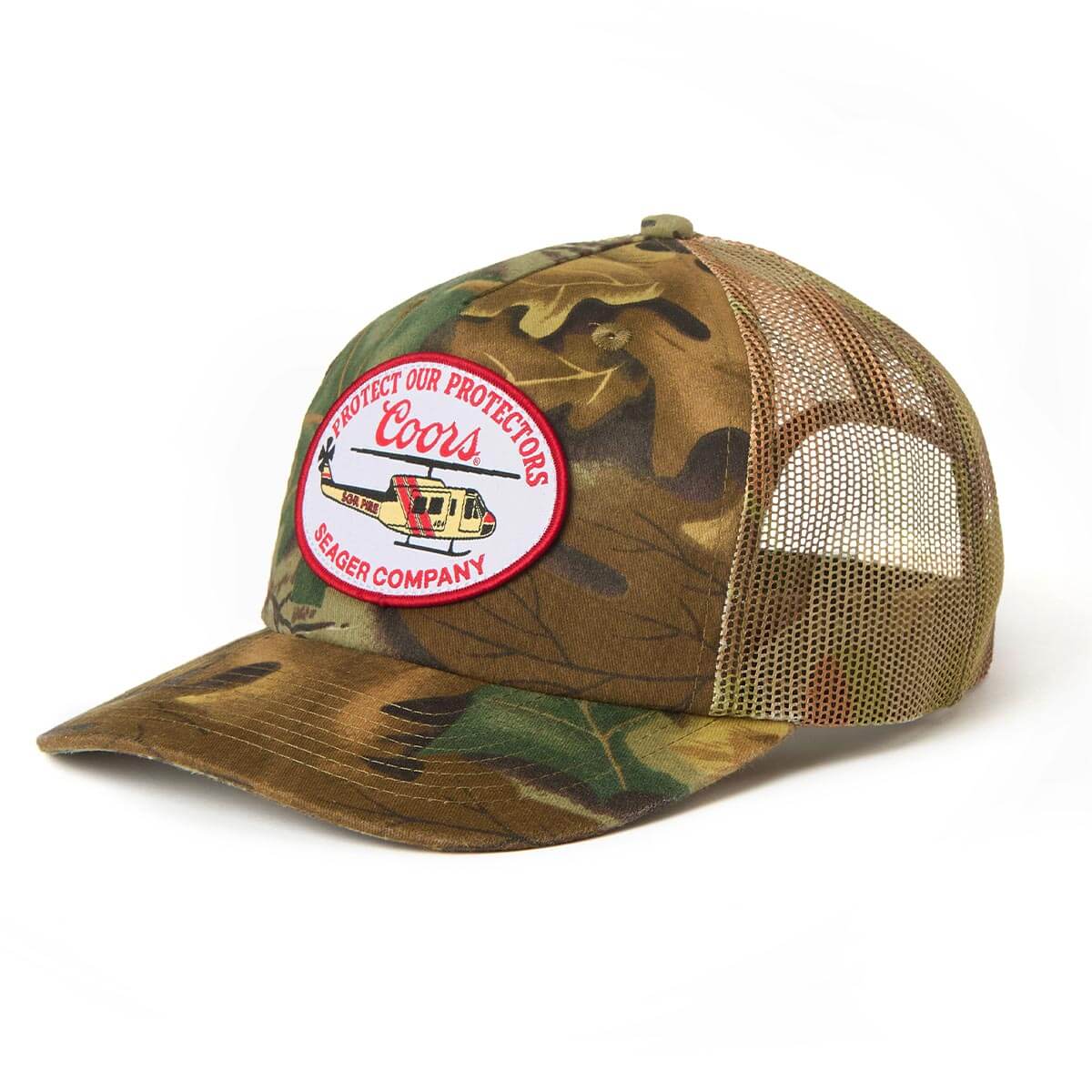 Close-up of Coors Banquet Helo Trucker Green Hat showing Camouflage front panel with red and white circular patch featuring