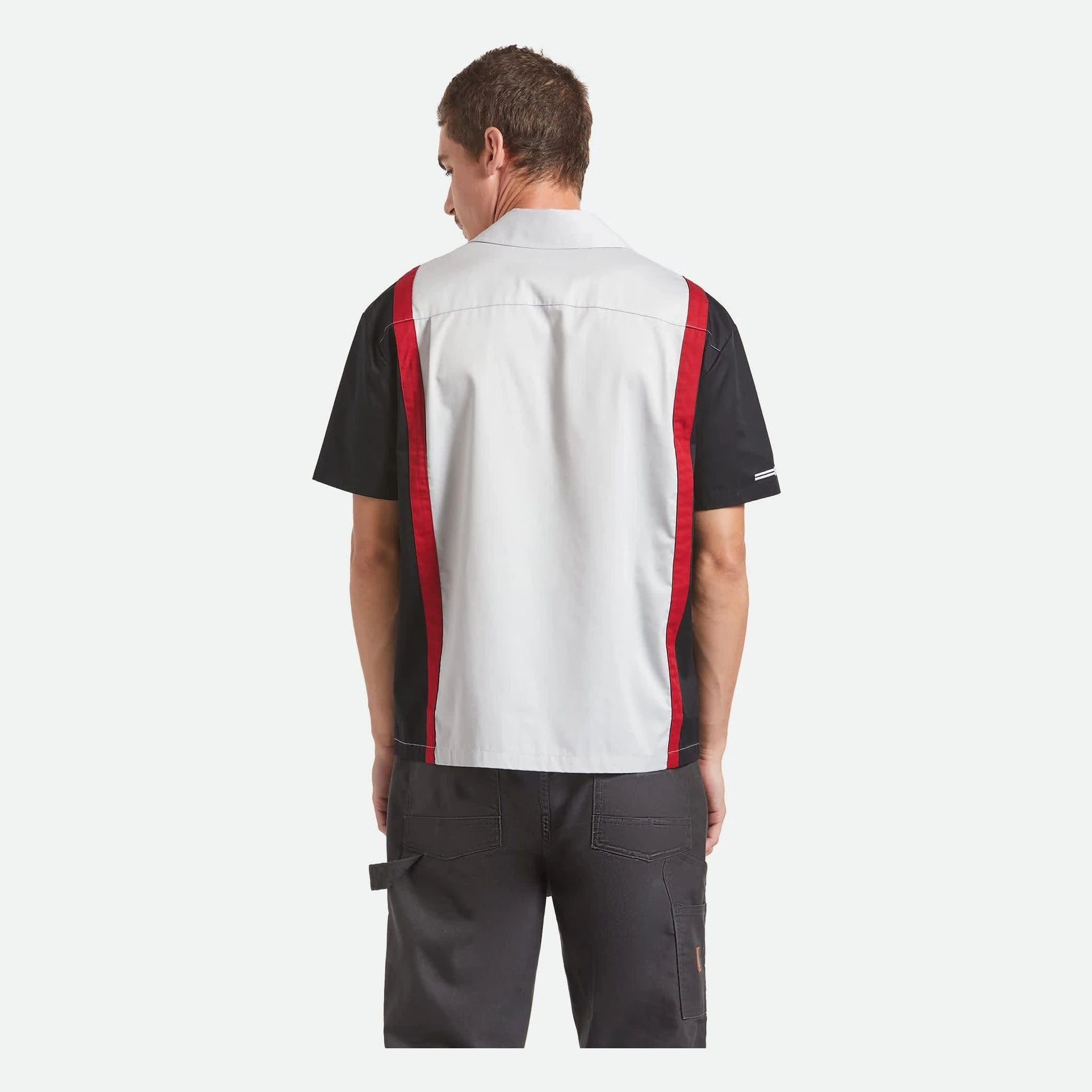 Person wearing Coors Light Shake Down S/S Woven Silver/black S/S Woven, Wearer stands against neutral white studio
