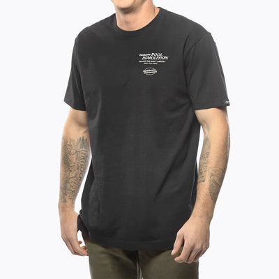 Person wearing Demolition Black Tee, Man wearing black tee against plain white background - Slowride Supply