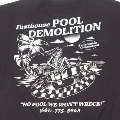 Close-up of Demolition Black Tee showing White halftone graphic of skeletal figure piloting checkered hovercraft over desert
