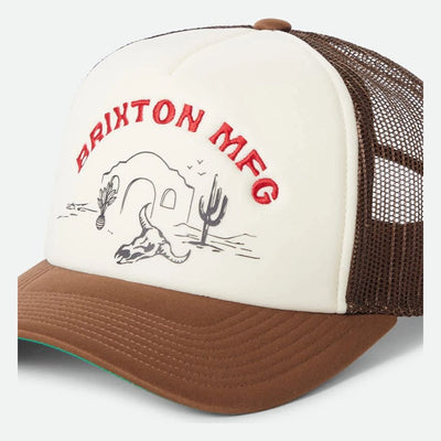 Desert Leisure MP Trucker Apparel front view, Cream front panel with red embroidered text and desert skull graphic, brown