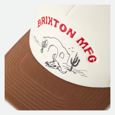 Close-up of Desert Leisure MP Trucker Apparel Pinecone Brown/Whitecap Apparel showing Red embroidered text and black