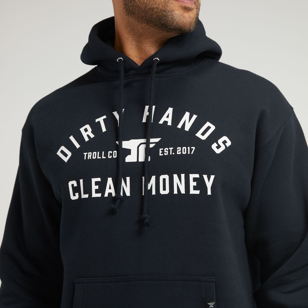 DHCM Classic front view, Black hoodie with white text reading "Dirty Hands Clean Money," Troll Co logo, and "Est. 2017,