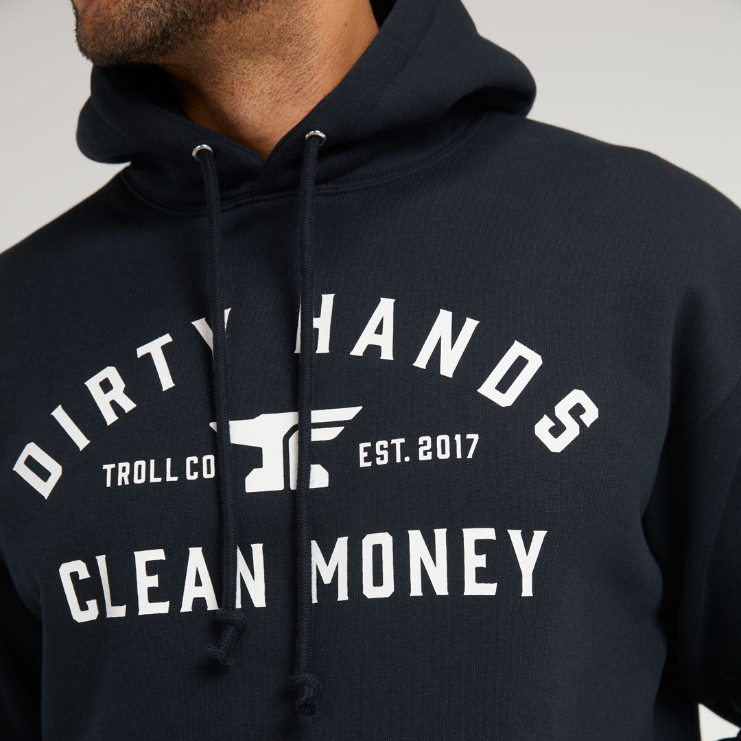 Person wearing DHCM Classic Black Hoodie, Man wearing black hoodie against neutral studio background - Slowride Supply