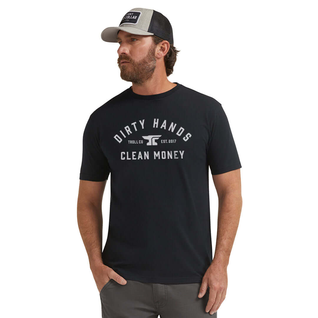 Person wearing DHCM Classic Black Tee, Man wearing black tee in neutral studio setting against white backdrop - Slowride