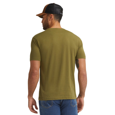 Person wearing DHCM Classic Black Tee, Man wearing olive tee standing indoors against white background - Slowride Supply