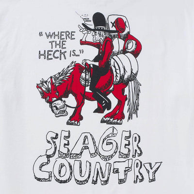 Close-up of Donde White Tee showing Cowboy rider on bucking horse in red and black with white, text reads "Where the Heck