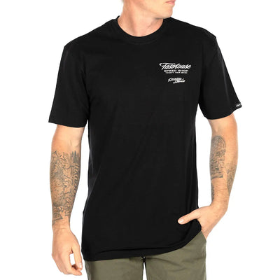 Person wearing Drive in Black Tee, Man wearing black tee standing against plain white background - Slowride Supply