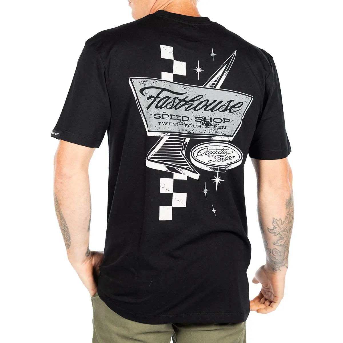 Person wearing Drive in Black Tee, Wearer standing against white background, showcasing rear graphic placement and fit -