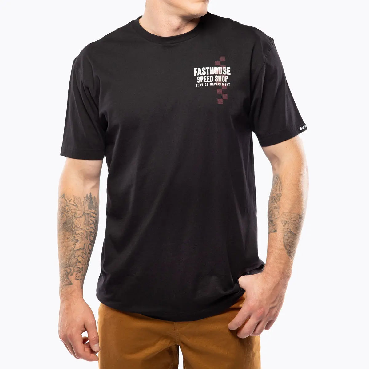 Person wearing Finch Black Tee, Worn casually in neutral studio setting with warm lighting - Slowride Supply