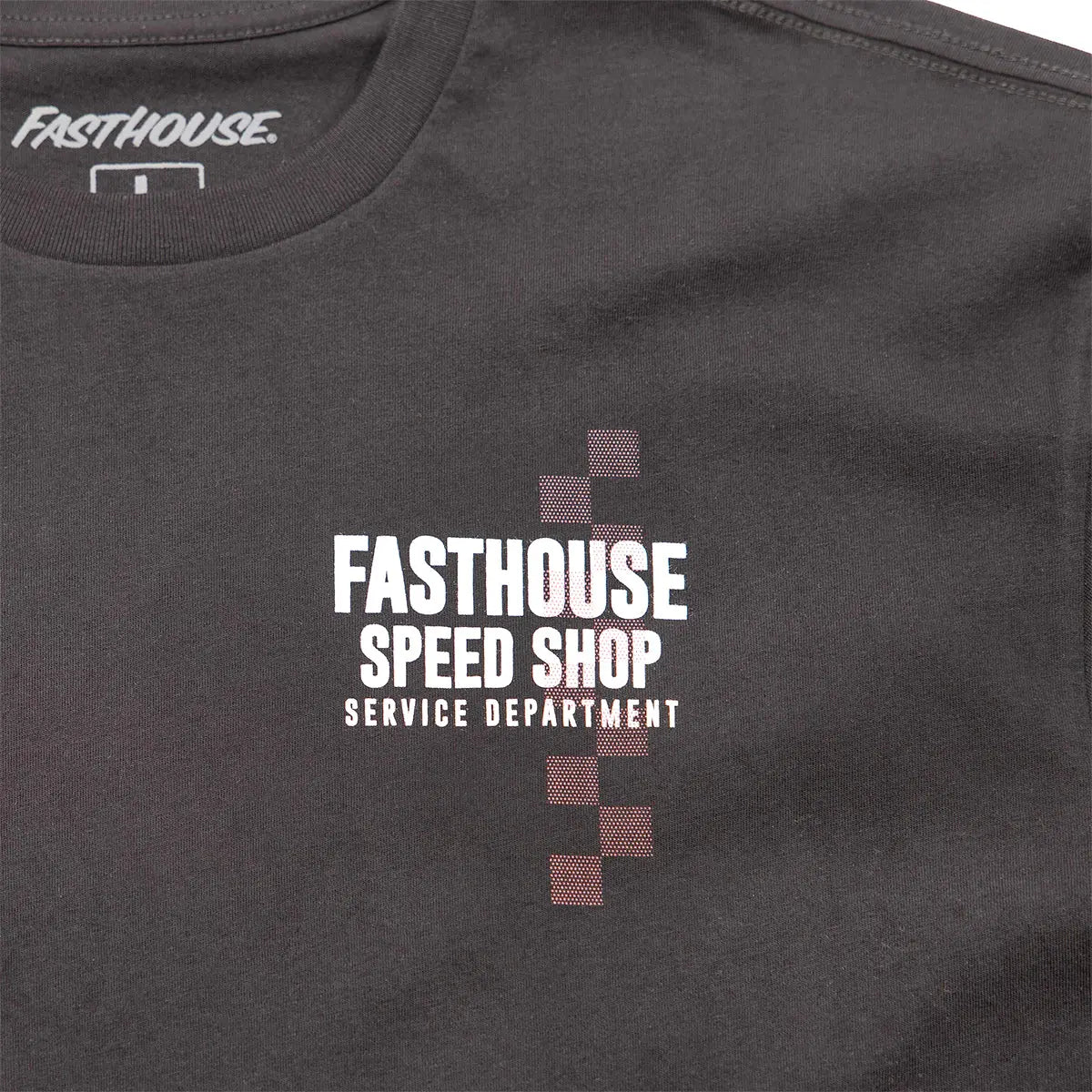 Close-up of Finch Black Tee showing Halftone cross graphic with white text and mauve dotted pattern detail - Slowride Supply