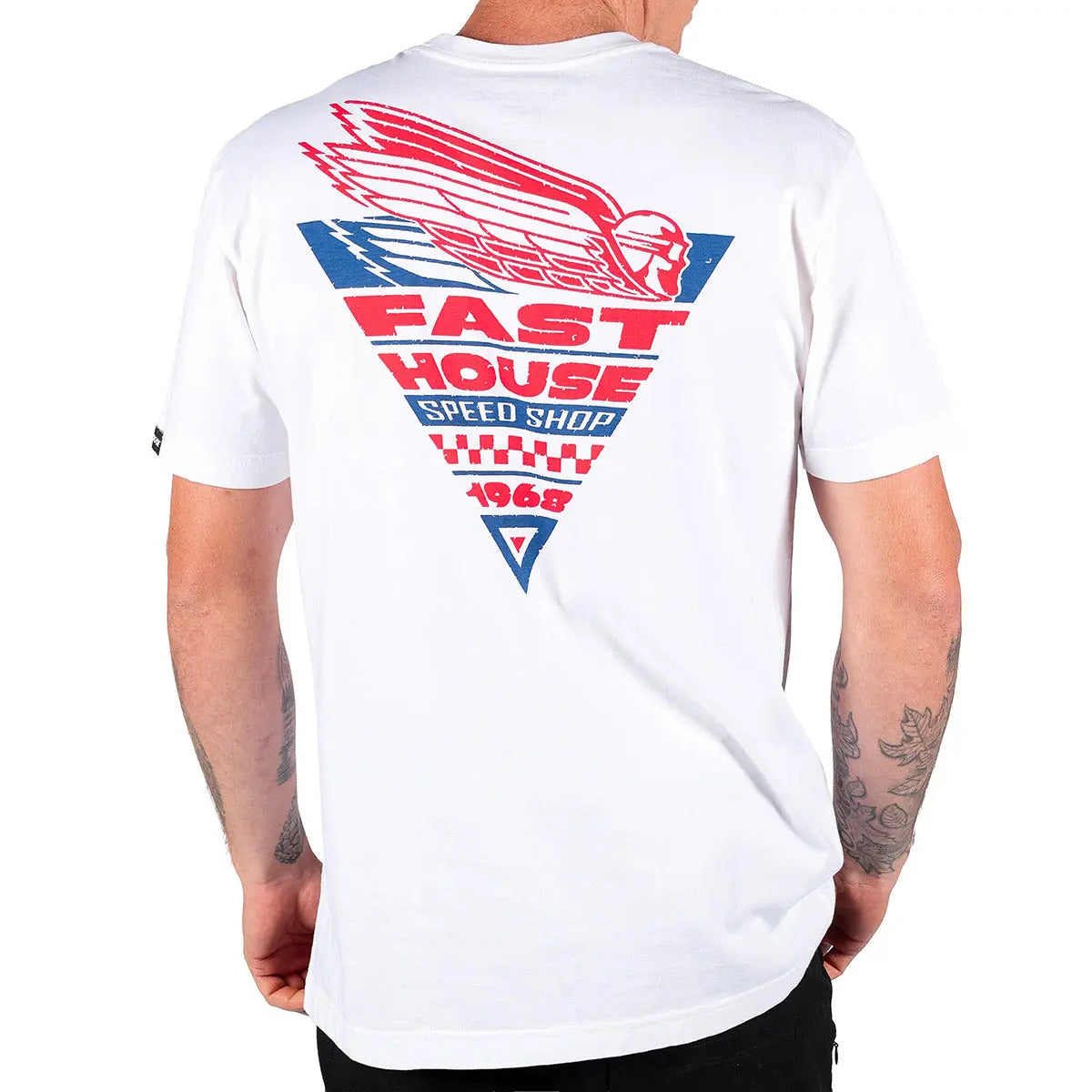 Person wearing Flyer White Tee, Man wearing white tee standing indoors against plain background - Slowride Supply