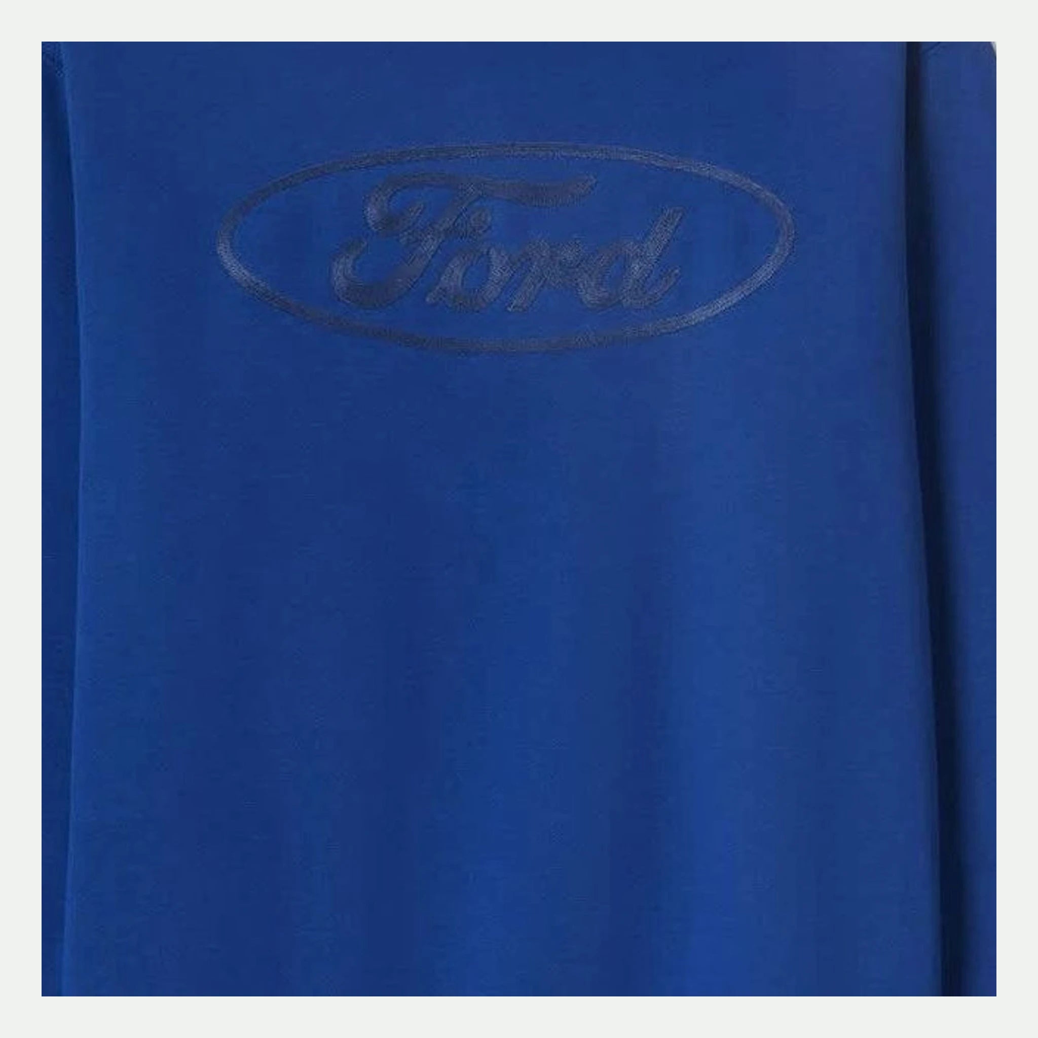 Close-up of Ford Number One Fleece Crew Ford Blue Crewneck showing Tonal embroidered oval logo with script text on chest