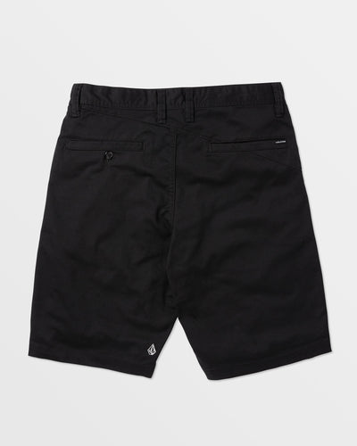 Back of Frickin Modern Short Shorts Black Shorts, Black shorts with rear patch pockets and small white logo at hem -