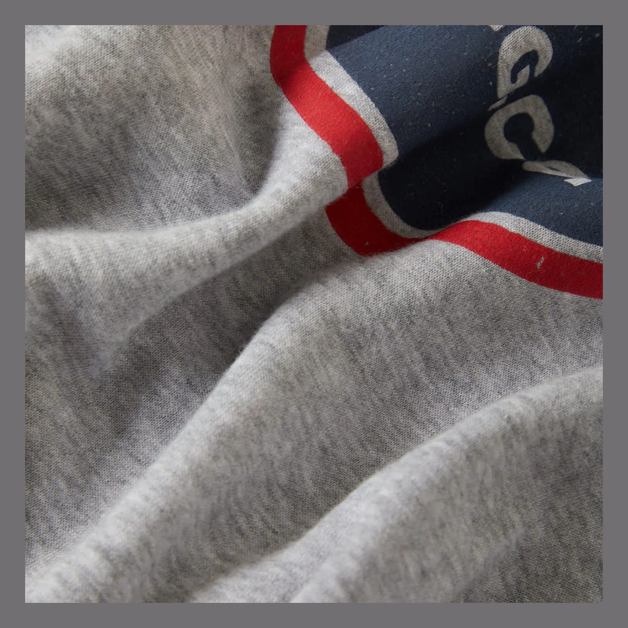 Close-up of Genuine Quality Gunmetal Hoodie showing Ribbed crew neckline with red and white striped trim detail - Slowride