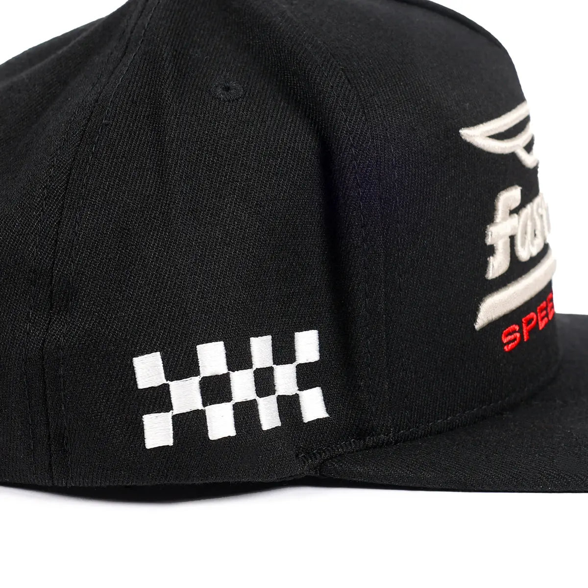 Close-up of Gilmore Black Hat showing White checkered flag embroidery on black cap front panel - Slowride Supply