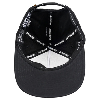 Close-up of Gilmore Black Hat showing White interior sweatband with repeated white text branding on black fabric band,