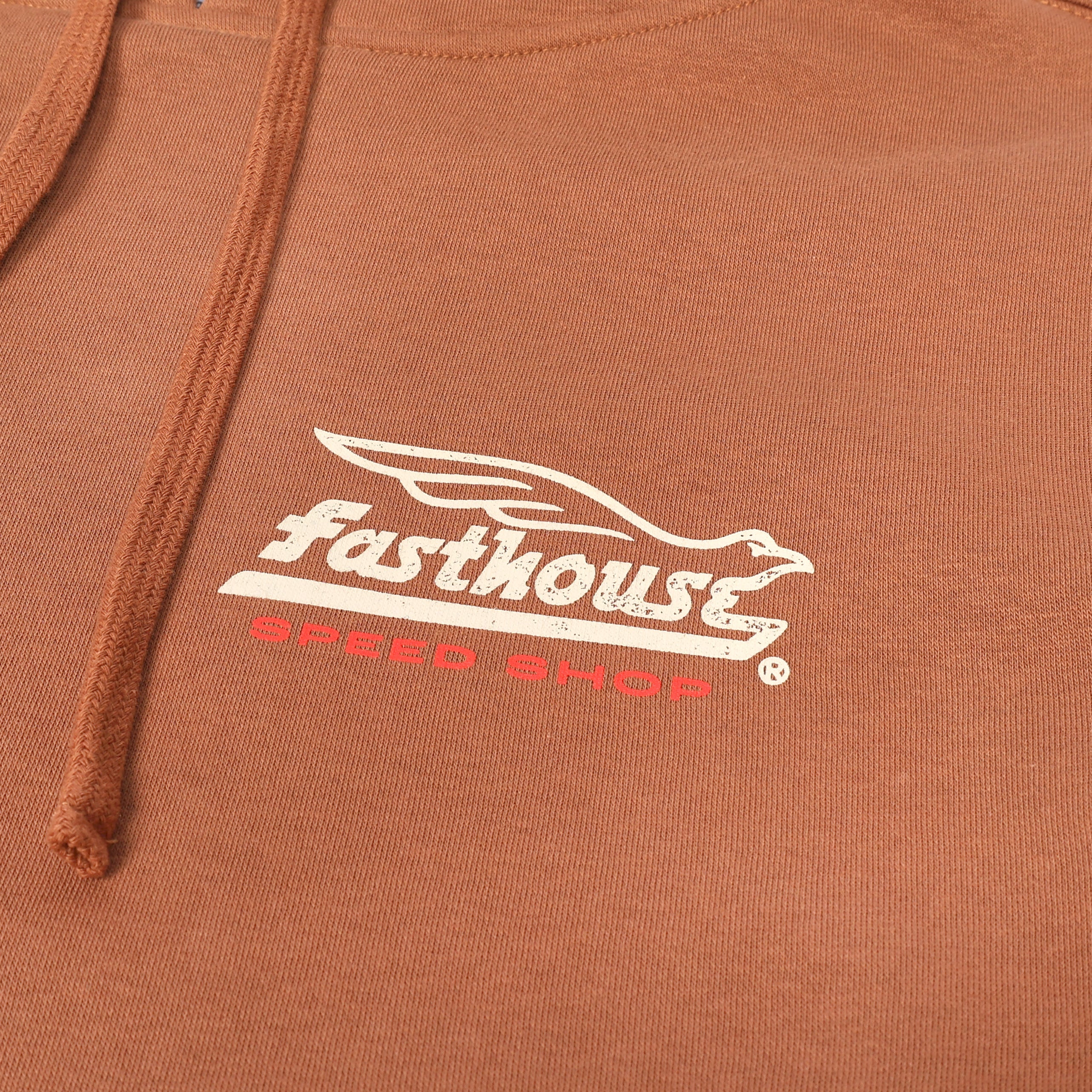 Close-up of Gilmore Hooded Pullover Apparel Chestnut Apparel showing White and red embroidered speedway graphic on chestnut