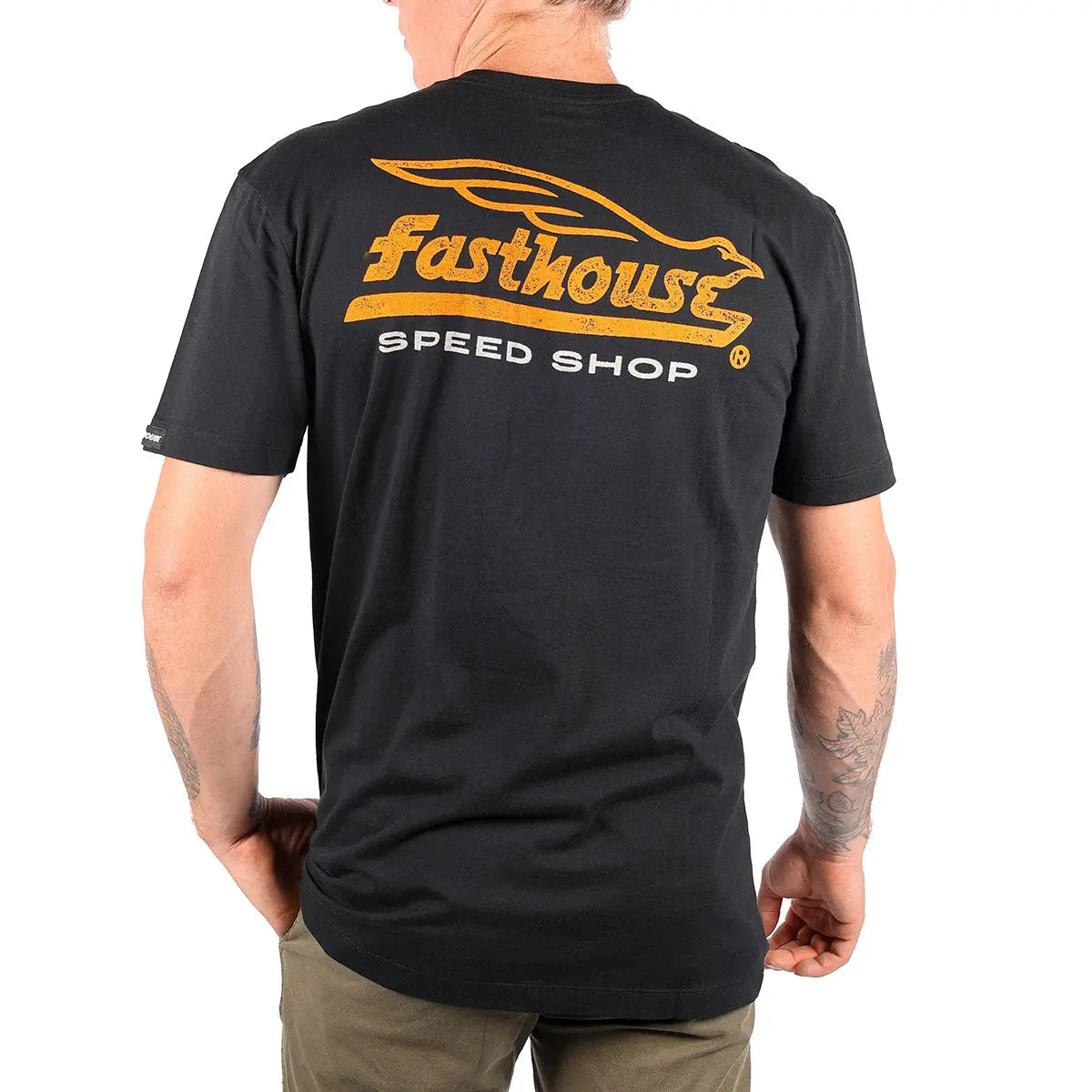 Person wearing Gilmore Black Tee, Man wearing black tee standing against plain white background - Slowride Supply