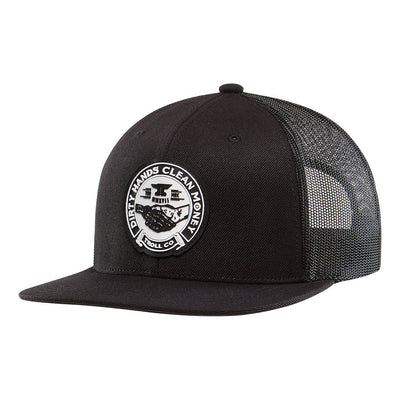 Haggler front view, Black trucker cap with white circular patch featuring engine graphic and "Dirty Hands Clean Money" text,