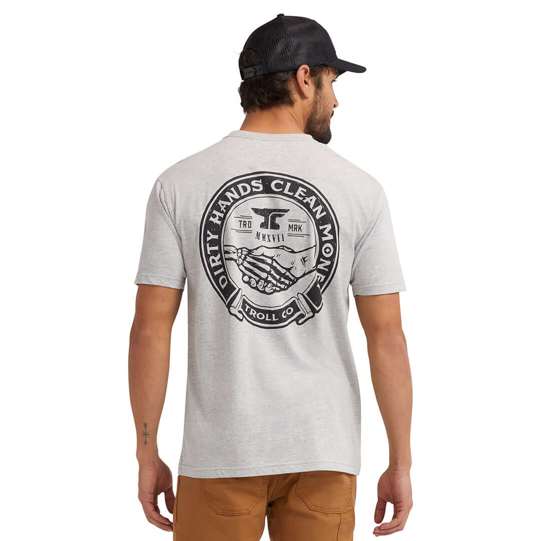 Person wearing Haggler Black Tee, Man wearing light gray tee with black circular back graphic, standing against white studio
