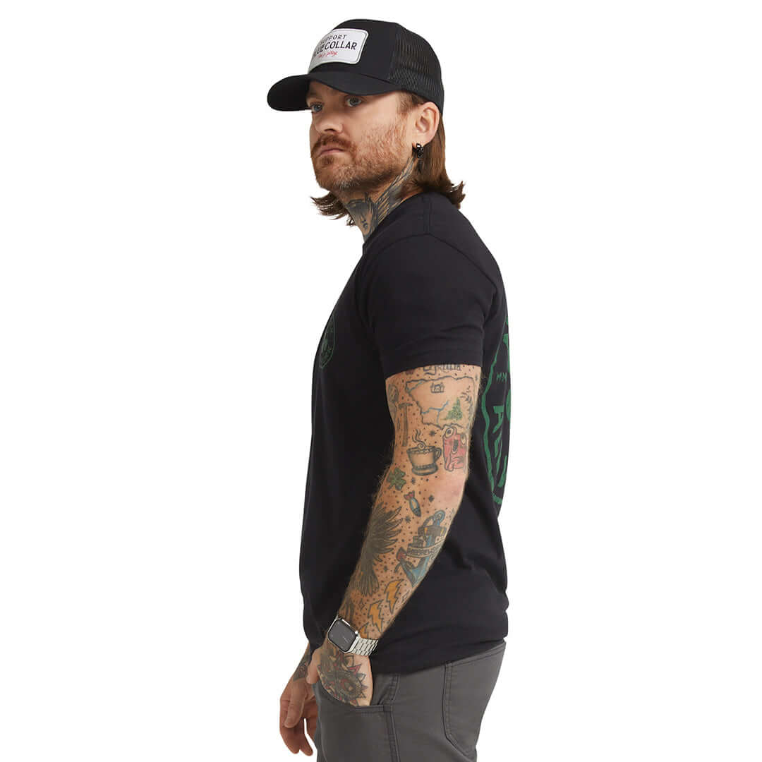 Person wearing Hardluck Black Tee, Man wearing black tee against white studio background - Slowride Supply