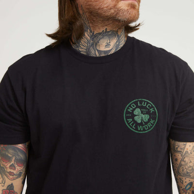 Person wearing Hardluck Black Tee, Man wearing black tee in neutral studio setting with white background - Slowride Supply