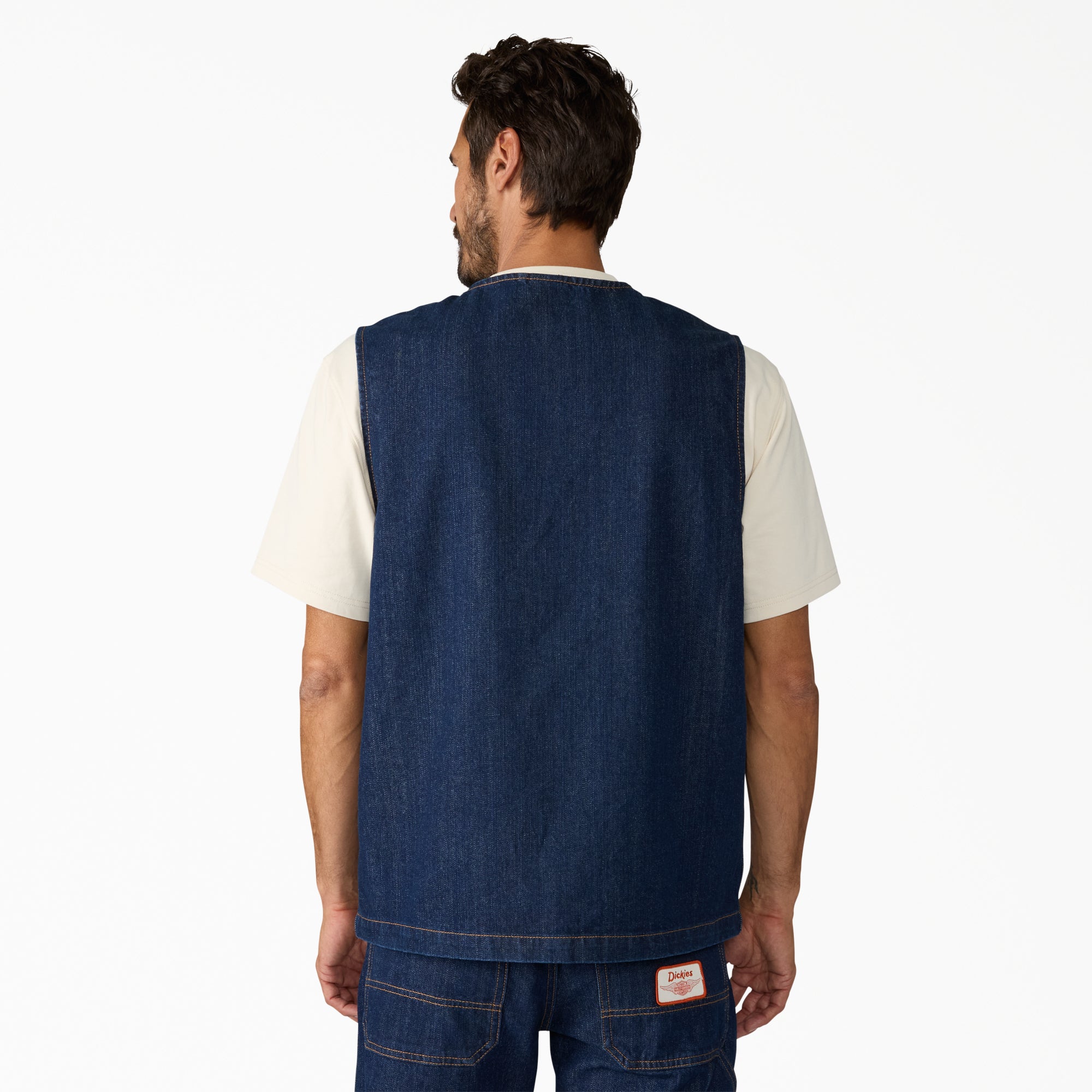 Person wearing Hdxdickies Denim Lined Vest RNB Vest Vest, Man wearing denim vest and white t-shirt against neutral white