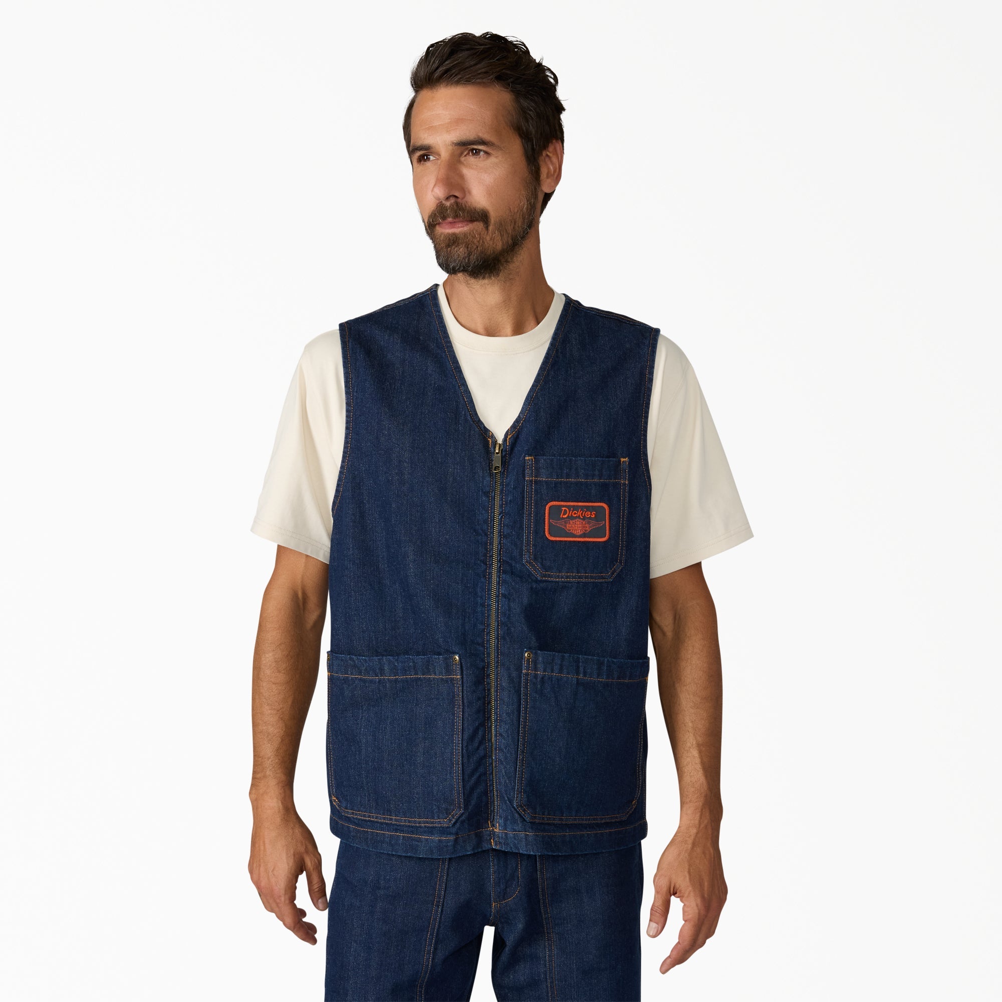 Person wearing Hdxdickies Denim Lined Vest RNB Vest Vest, Man wearing denim vest against neutral white background studio
