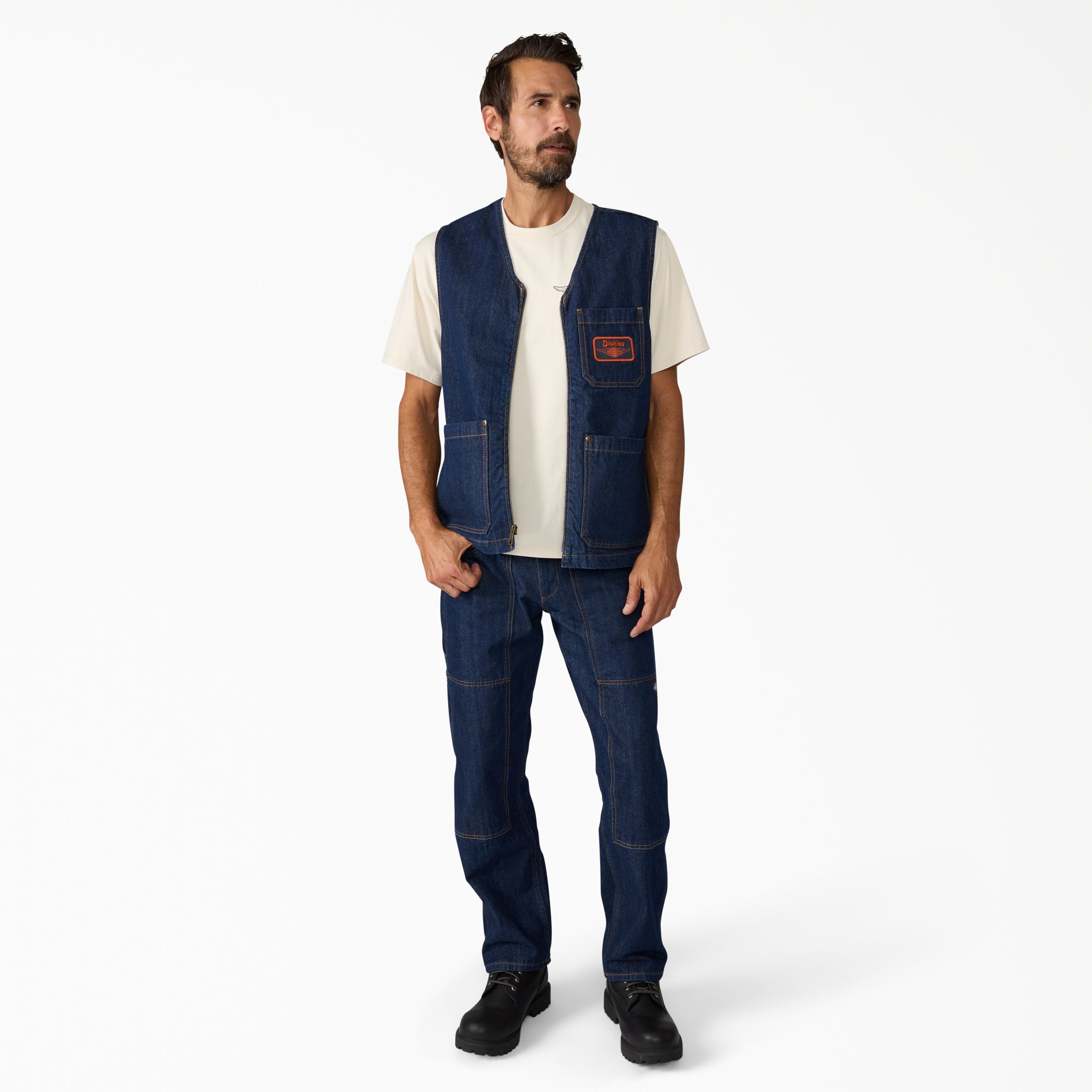 Person wearing Hdxdickies Denim Lined Vest RNB Vest Vest, Worn over cream tee in neutral studio setting with white backdrop