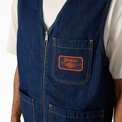 Close-up of Hdxdickies Denim Lined Vest RNB Vest Vest showing Orange embroidered patch on chest pocket with winged graphic