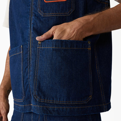 Person wearing Hdxdickies Denim Lined Vest RNB Vest Vest, Man wearing denim vest with orange trim against plain white