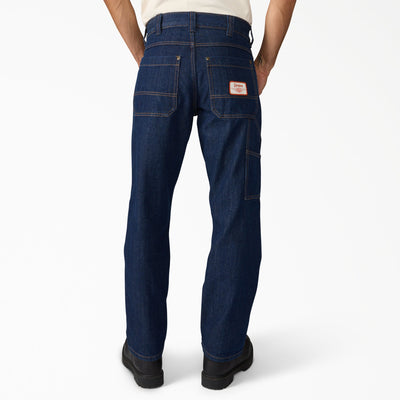 Back of Hdxdickies Denim Pant RNB Pants Pants, Dark indigo denim with tan topstitching and orange woven label patch on back