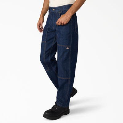 Person wearing Hdxdickies Denim Pant RNB Pants Pants, Man wearing dark indigo denim work pants against neutral white