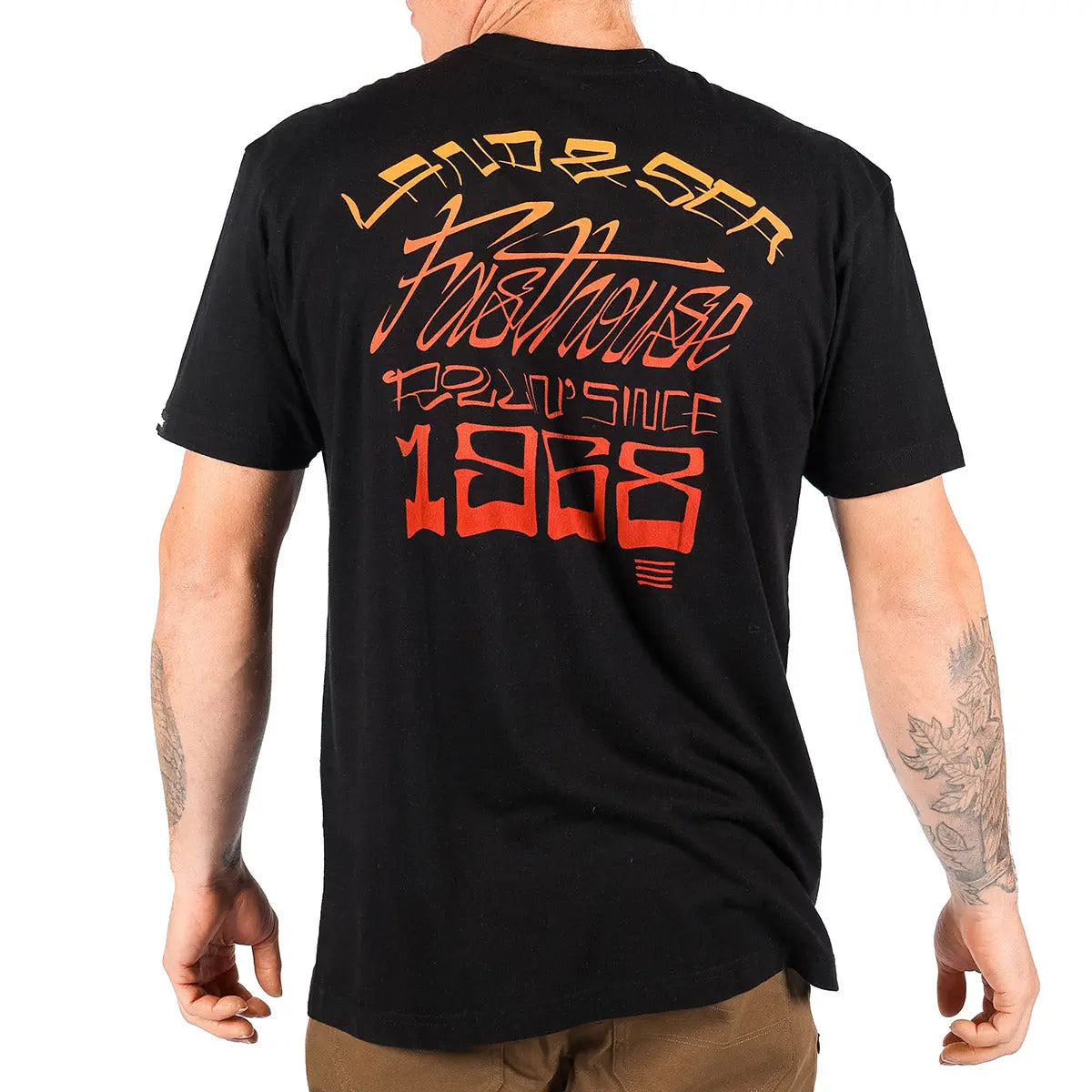 Person wearing Horizon Black Tee, Wearer standing against neutral white background, arms at sides - Slowride Supply